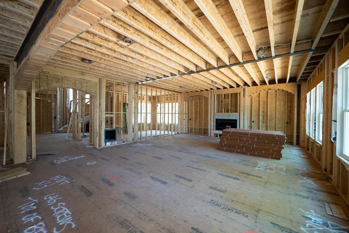 A finished Florida lower-level living room with flood-resistant flooring and mold-resistant drywall