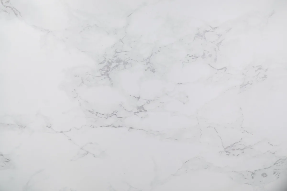 Close-up of a nonporous engineered quartz countertop surface with a polished edge profile