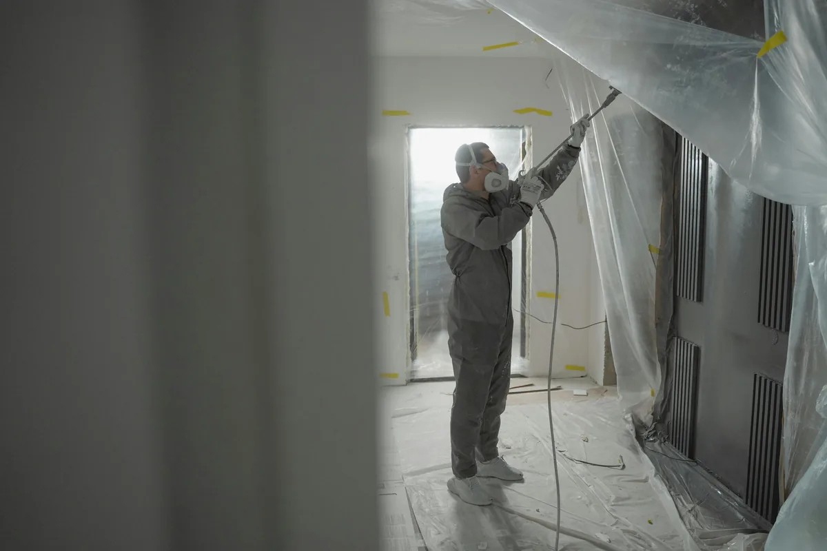 Hurricane straps and tie-down connectors forming a continuous load path on a Florida framed wall